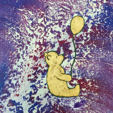 A yellow bear holding a balloon against a colorful, abstract background.