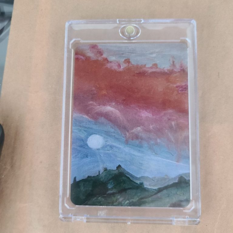 Landscape with a sunset, mountains, and a white sun in a colorful sky.